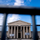 Temporary security fencing surrounds the U.S. Supreme Court in Washington, DC, on June 28, 2022. - The Supreme Court reinstated a Republican-drawn map of Louisiana Congressional districts this evening, keeping it in place for the 2022 election